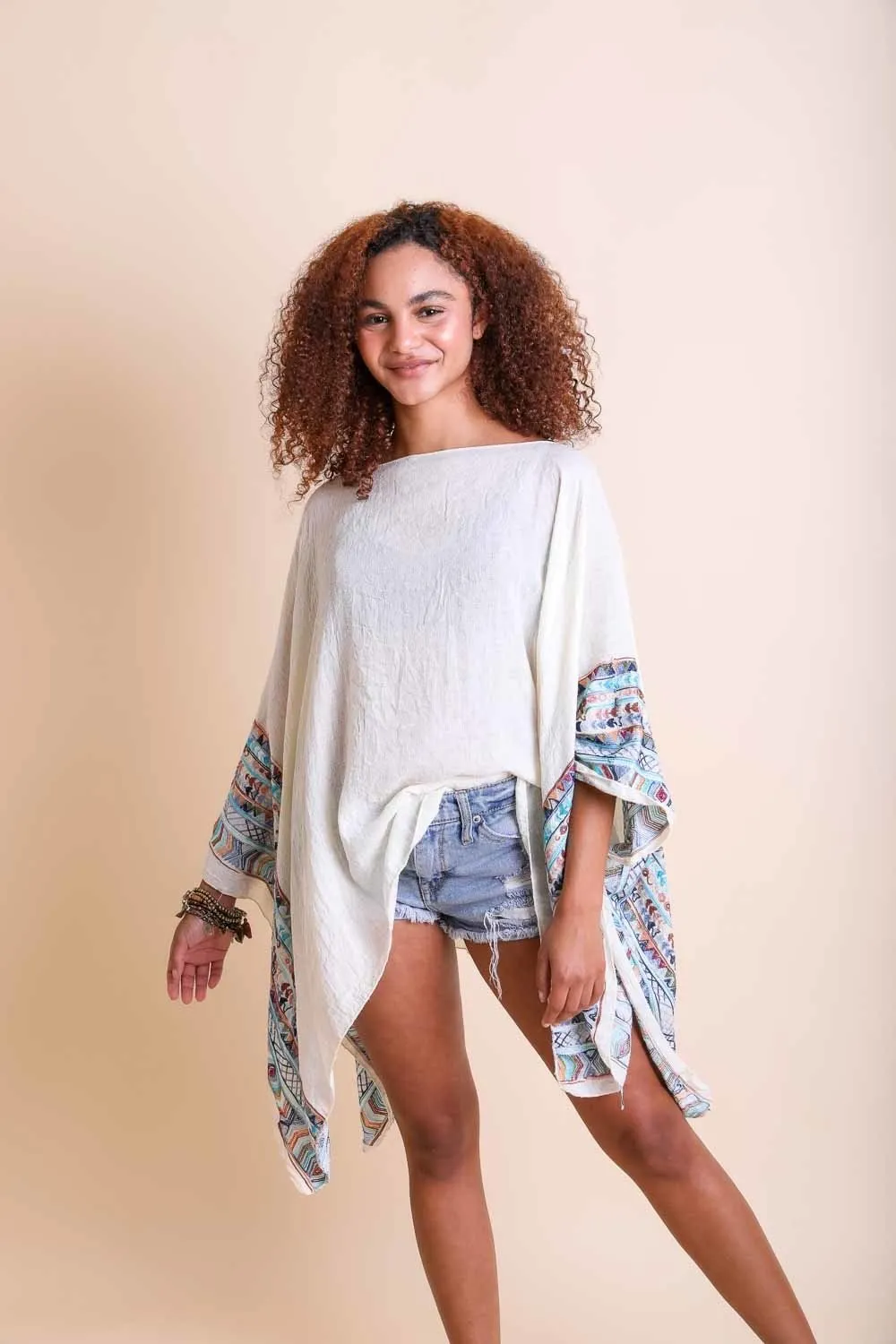 Geometric Embroidered Tunics.