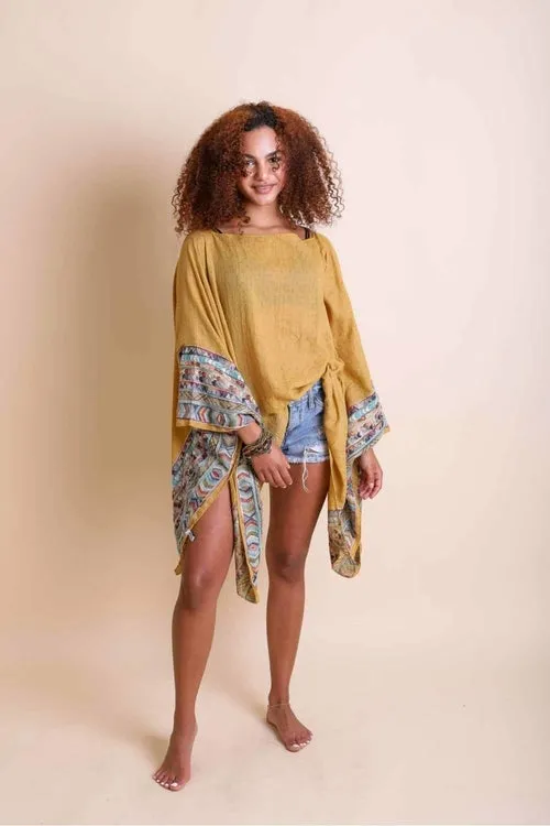 Geometric Embroidered Tunics.
