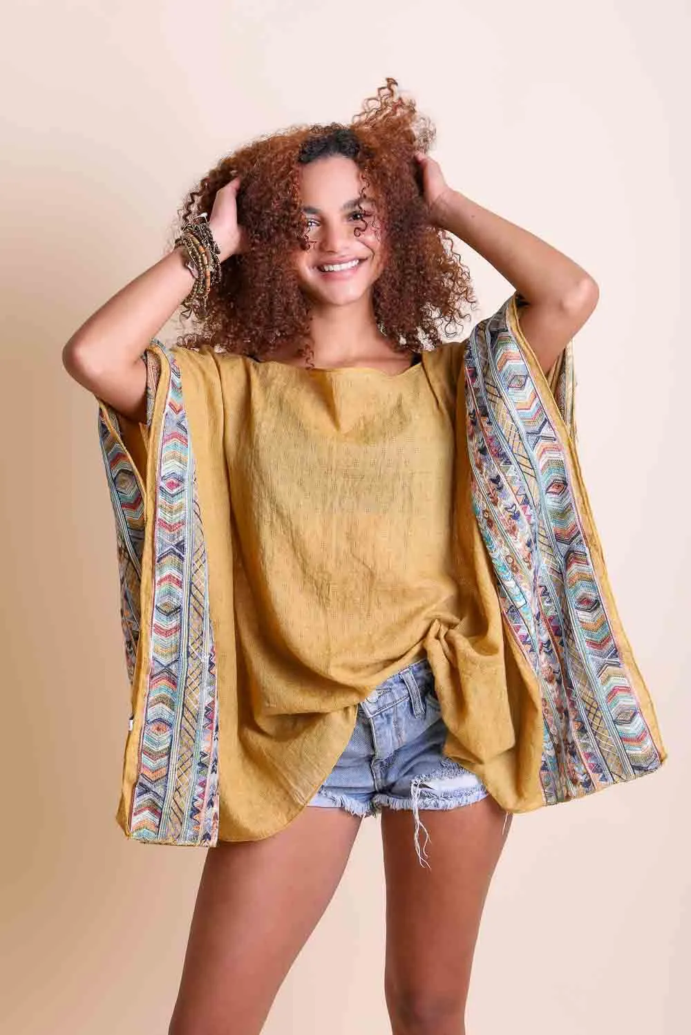 Geometric Embroidered Tunics.