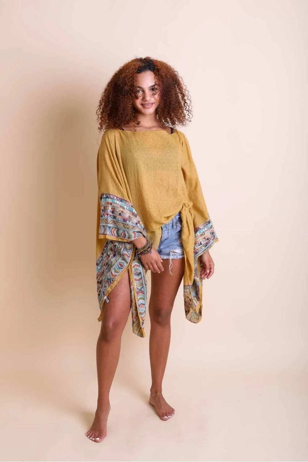 Geometric Embroidered Tunics.