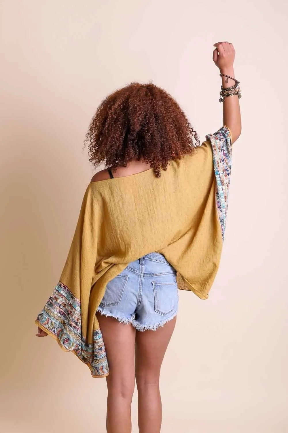 Geometric Embroidered Tunics.