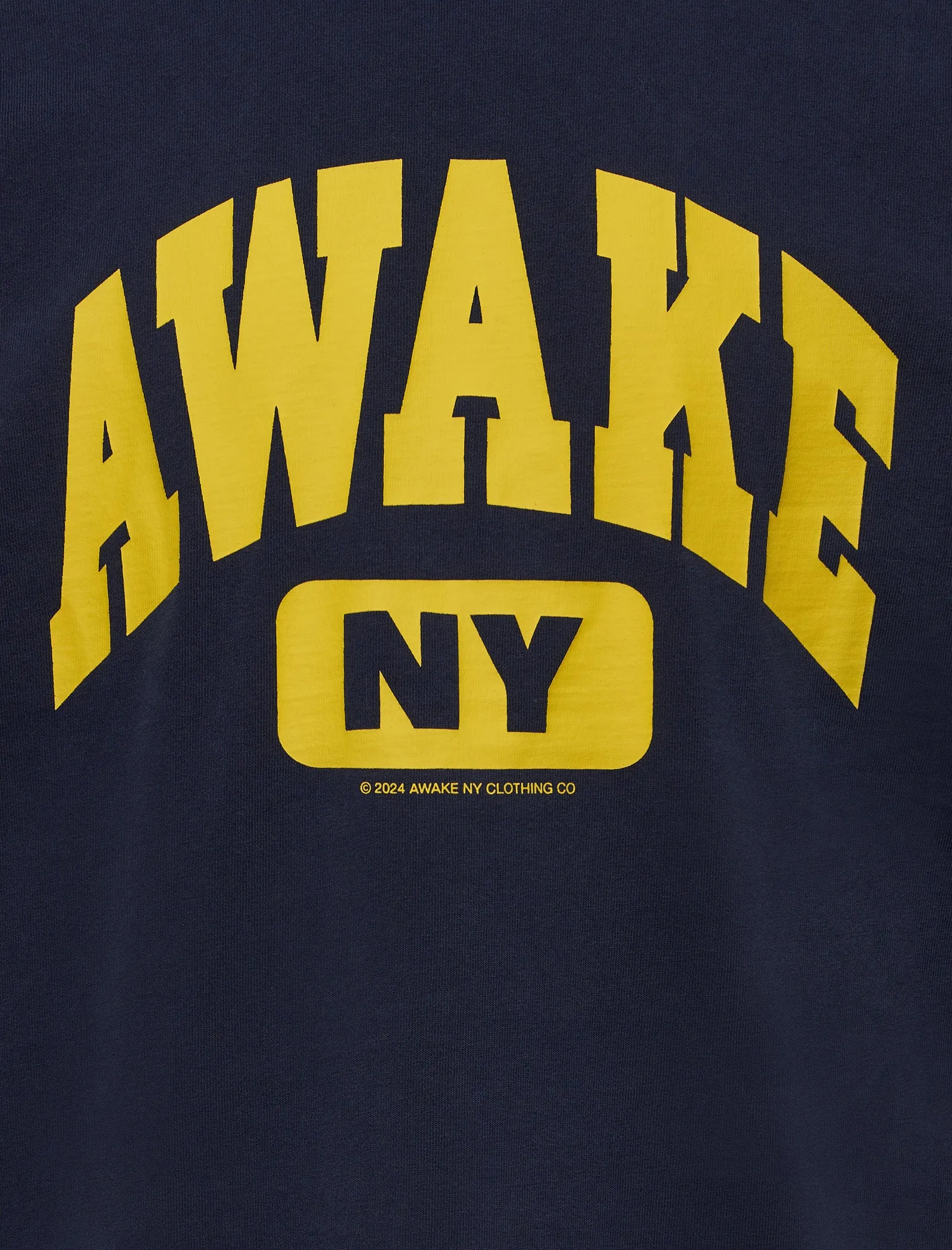 VARSITY TEE
